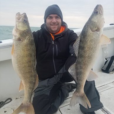 Captain Dave with two fish