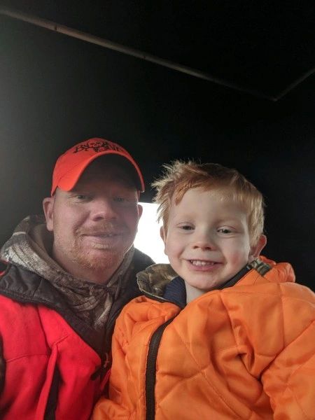 father and son on a muzzleloader hunt