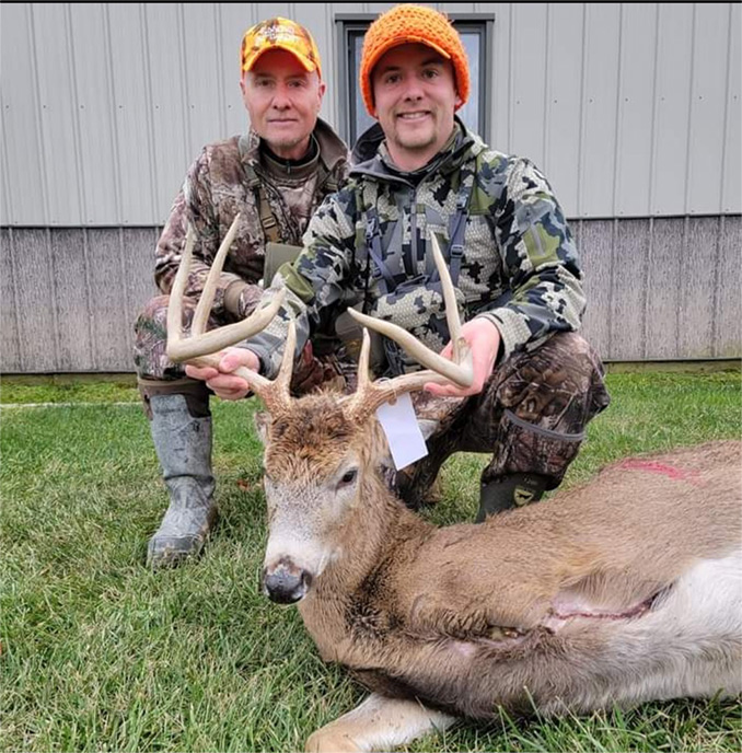 two men with buck