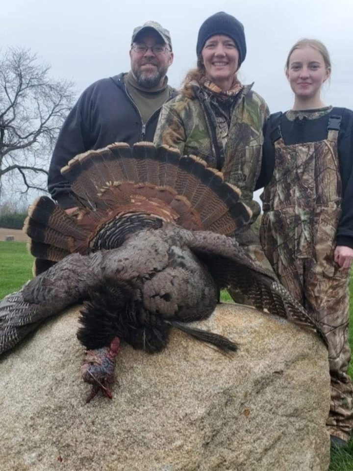 Family with large turkey